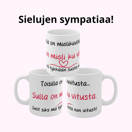 Mieli ku vitusta -ystävyysmuki, jossa punamusta, koko mukia kiertävä painatus ja tekstit: Toisilla on mielikuvitusta (ylhäällä), Sulla on mieli ku vitusta (keskellä), Just siks mä tykkään susta niin vitusti (alhaalla)